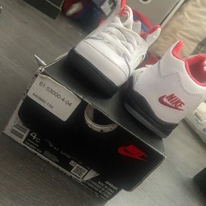 Jordan 5’s white red and black size 4c barely used with OG box included.